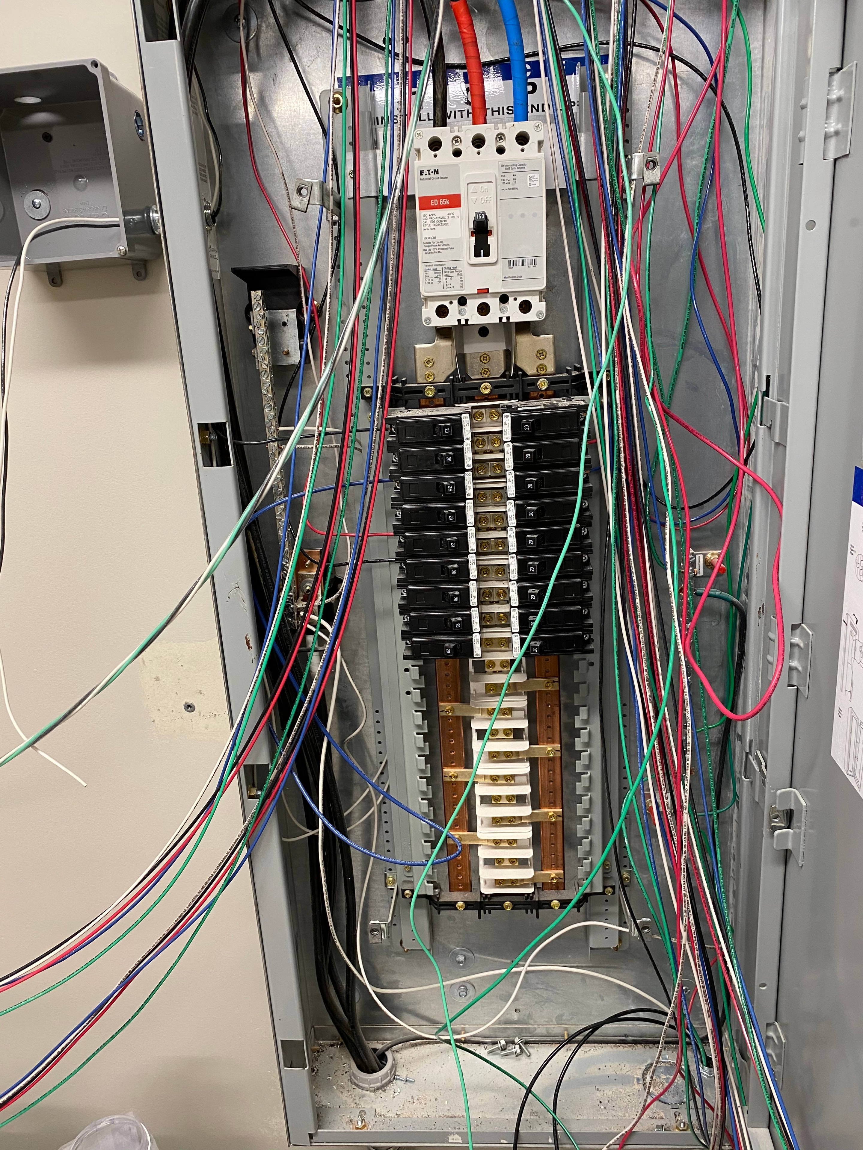 Residential electrical panel with circuit breakers and wiring